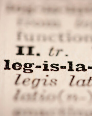 Word legislation from the old dictionary, a close up.